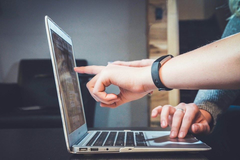 Student joining a live online class on a laptop